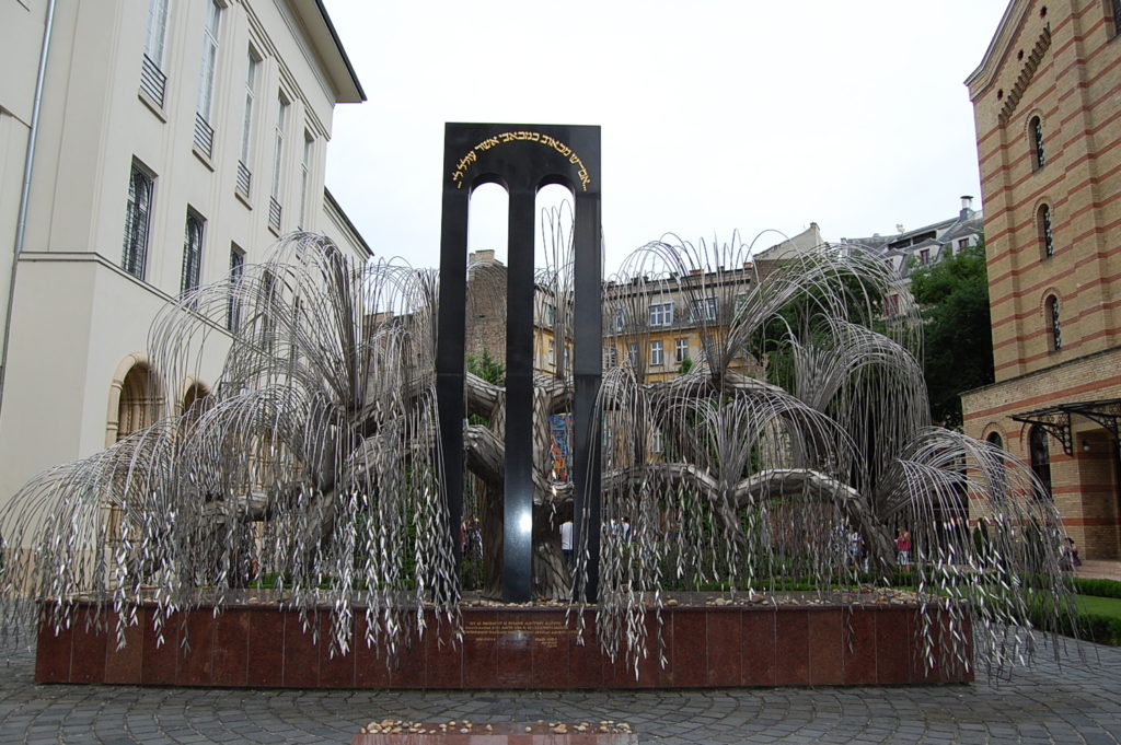 tree with black sculpture